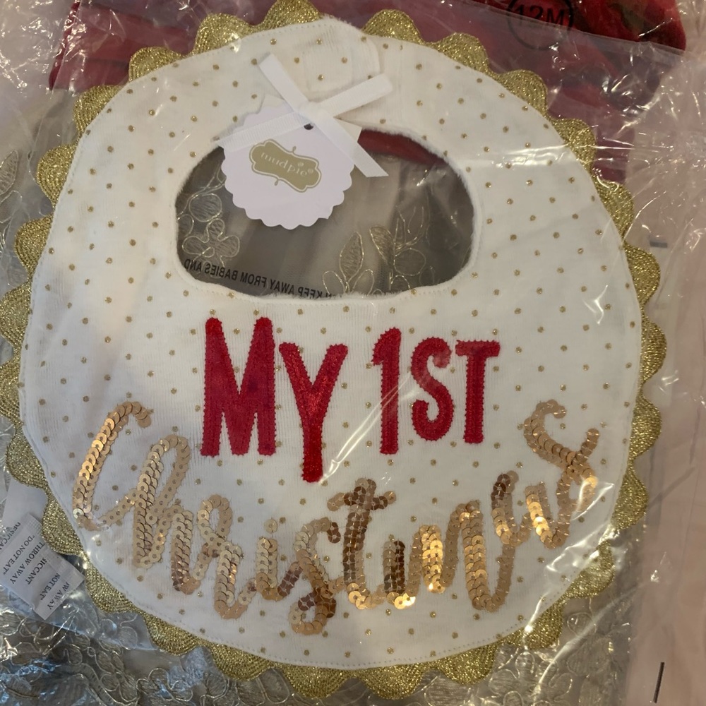 Brand New with tags in original packaging. Mud Pie “MY FIRST CHRISTMAS” Bib.
